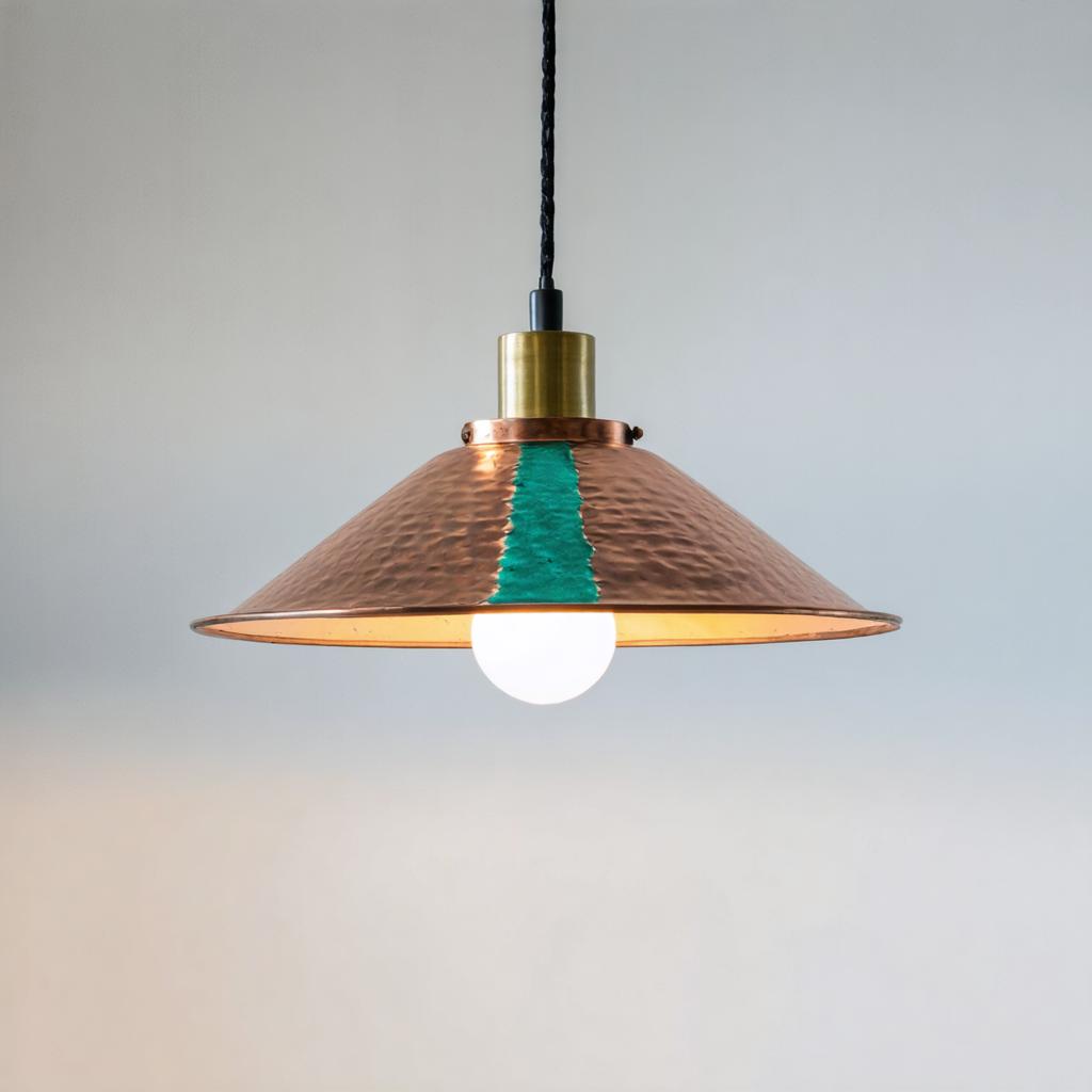 Discover the stunning capabilities of Stable Diffusion Ultra image generator with this beautifully crafted pendant light. Featuring a copper dome with a vibrant teal stripe, this AI-generated image showcases the tool's ability to create unique and visually appealing designs effortlessly. Perfect for highlighting the precision and creativity of Stable Diffusion Ultra in generating high-quality images for any project.