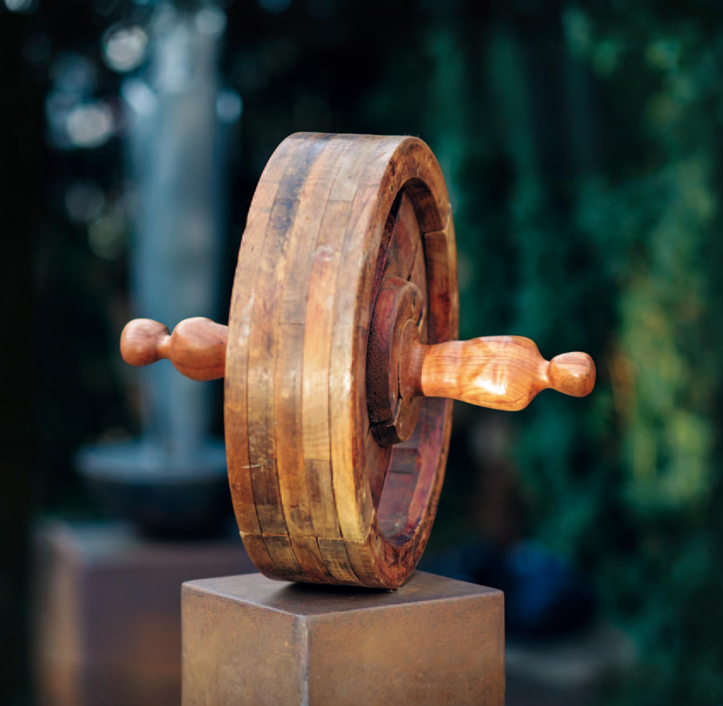 Transform your images with Stable Assistant's 'Erase' tool, which effortlessly removes unwanted objects, as demonstrated by this image where a wooden wheel is seamlessly integrated into a natural, outdoor setting. Perfect for enhancing visual clarity and focus, 'Erase' ensures your images are polished and professional, driving traffic and engagement.
